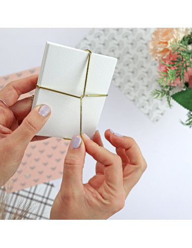 1 metro cordón elástico dorado