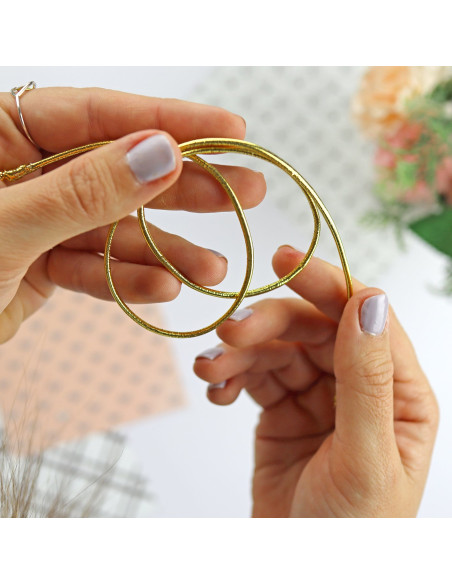 1 metro cordón elástico dorado