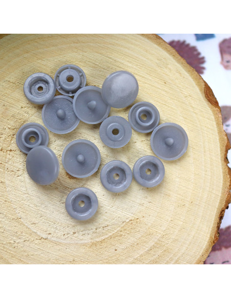 Broches plásticos de presión Gris